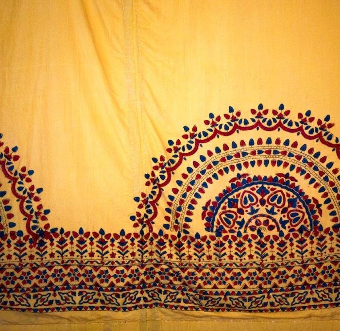 Saffron yellow marquee lining hire - blue and red pattern